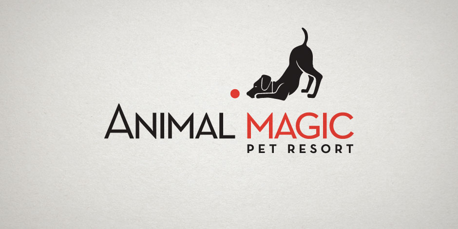 Logo of Animal Magic Pet Resort featuring a stylized black dog playfully pouncing at a red ball, with the resort's name written in black and red letters.
