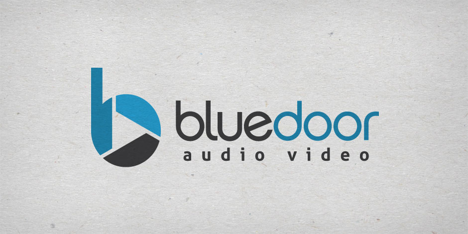 Logo of Blue Door Audio Video featuring a stylized blue and black "bd" icon to the left and the words "blue door audio video" in lowercase letters beside it.